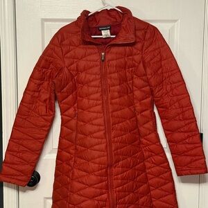 Patagonia Women's Fiona Parker in reddish-orange.